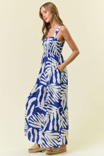 Load image into Gallery viewer, Doe + Rae Cobalt Floral Smocked Jumpsuit