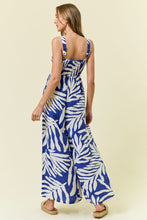 Load image into Gallery viewer, Doe + Rae Cobalt Floral Smocked Jumpsuit
